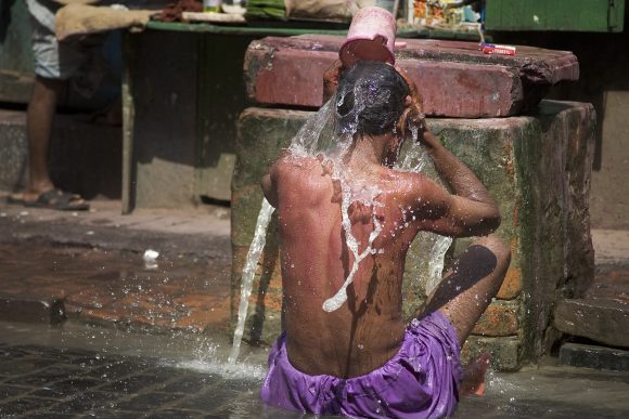 Man Refreshing on the street, Calcutta Kolkata India