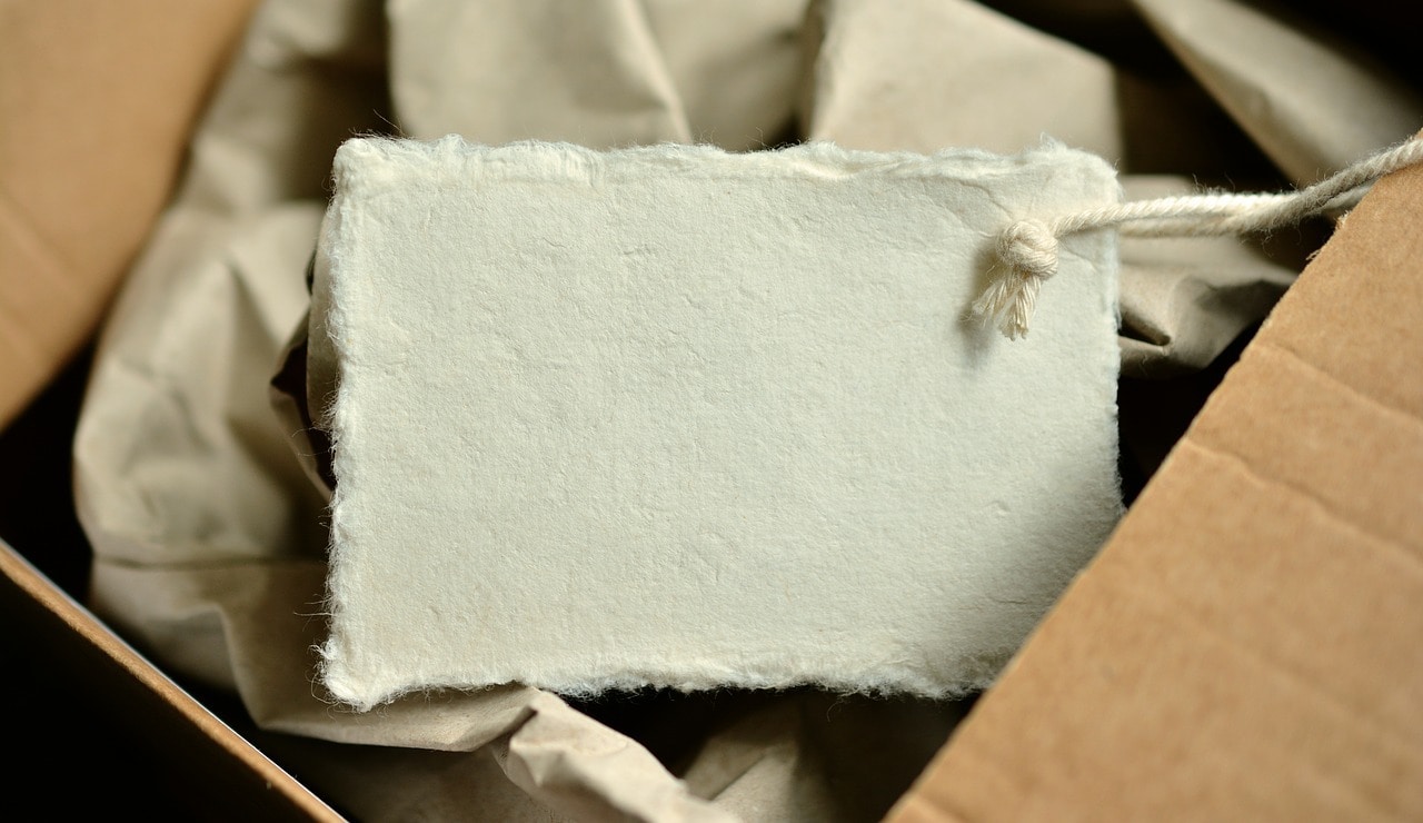 cardboard box with scrunched paper
