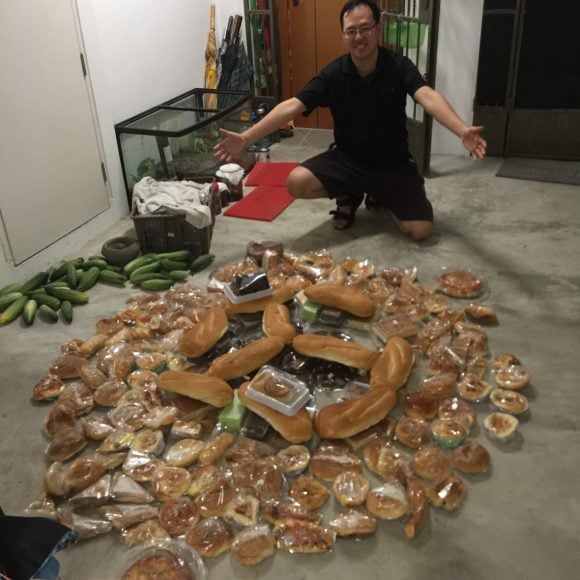 Daniel and his bread collection (Freegan in Singapore)