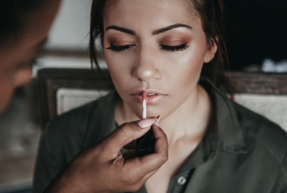 woman and man near white wall