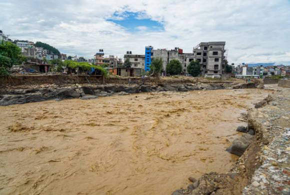 The Nakhu River flooded and affected the riverbanks and homes during heavy rainfall in Lalitpur, Nepal, on September 29, 2024.